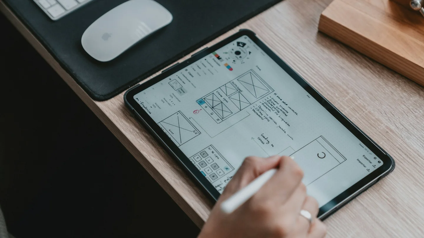TheWebSolve UX/UI product designers collaborating on comprehensive design systems and interactive prototypes